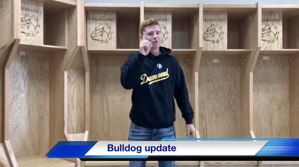 bulldog update, student standing in locker room
